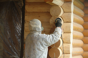 Шлифовка торцов бревна