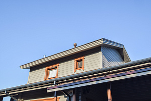 Финская надежность и русское брусовое зодчество: реставрация дома в Никольском краской Tikkurila Vinha