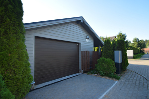 Финская надежность и русское брусовое зодчество: реставрация дома в Никольском краской Tikkurila Vinha