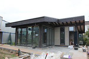 Масштабная реконструкция загородного дома: термоясень, фахверк с историей и идеальная геометрия каждого элемента