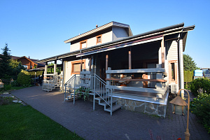 Финская надежность и русское брусовое зодчество: реставрация дома в Никольском краской Tikkurila Vinha