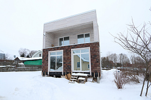 Современный каркасный дом с эксплуатируемой кровлей у Озера Врево