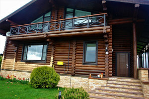 покраска брусового дома