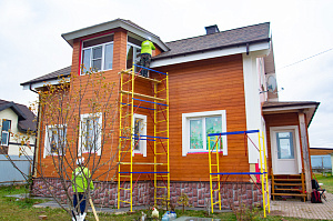обшивка фасада крашенным планкеном