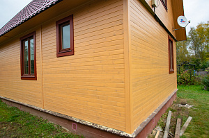 покраска деревянного дома