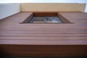 Комбинированная отделка фасада и бани в стиле "хай-тек"