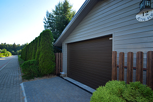 Финская надежность и русское брусовое зодчество: реставрация дома в Никольском краской Tikkurila Vinha