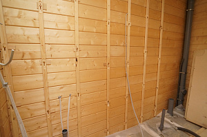 Вдохнуть жизнь в стены: полный цикл отделки дома из клееного бруса