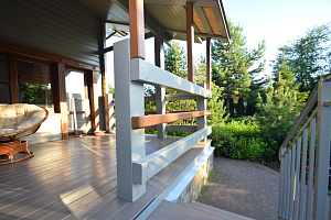 Финская надежность и русское брусовое зодчество: реставрация дома в Никольском краской Tikkurila Vinha