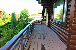 покраска дома из бревна