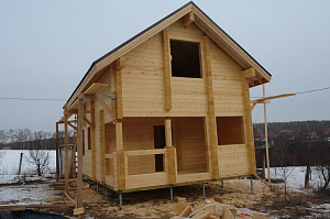 Покраска дома из бруса
