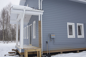 Дом обшитый сайдингом