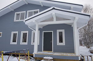 Дом обшитый сайдингом