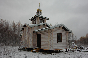 покраска фасада дома из бревна