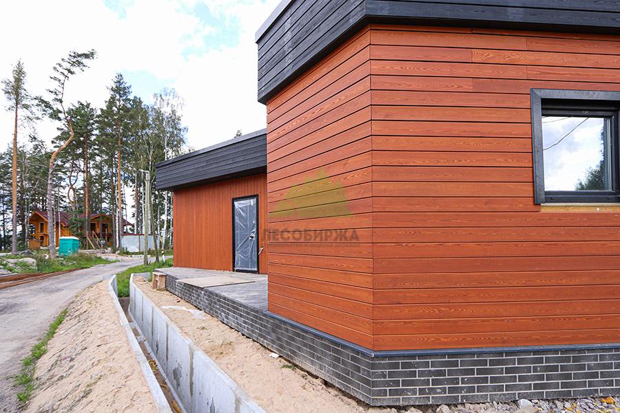 Дом обшитый лиственницей Дом обшитый лиственницей