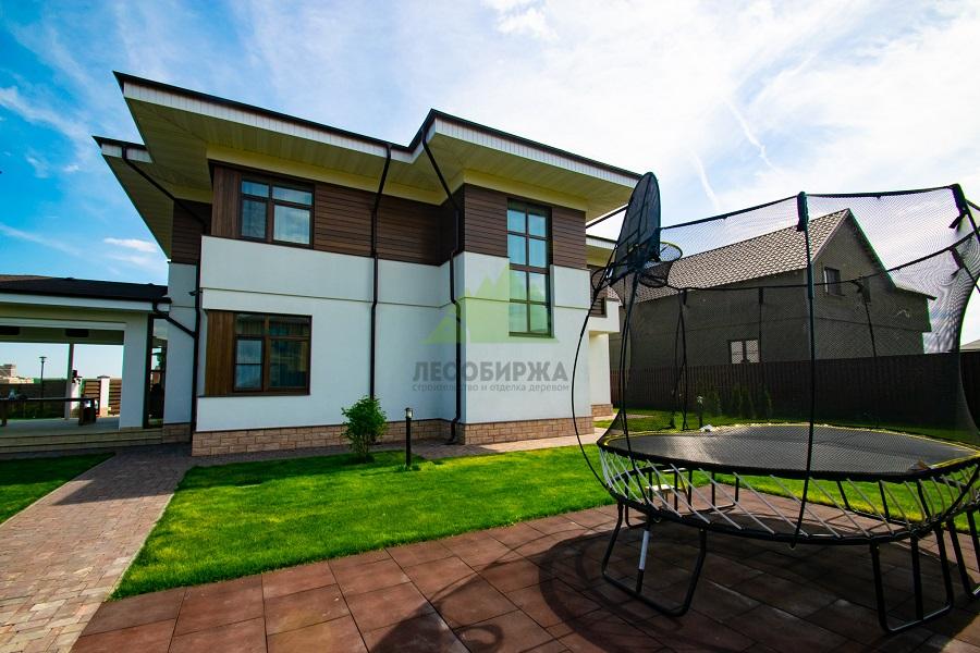 Отделка фасада коттеджа планкеном