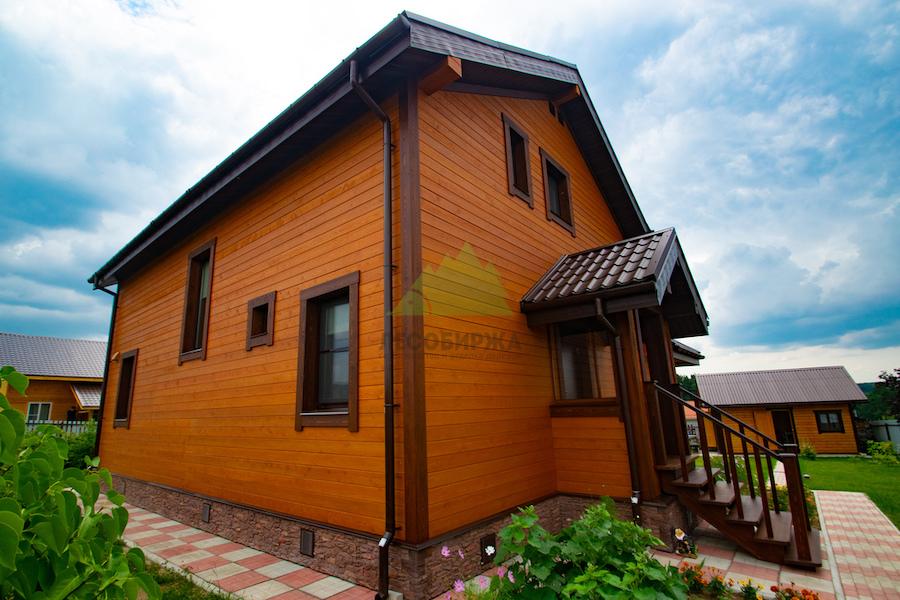 скошенный планкен на фасаде